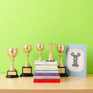 School trophies and books celebrating academic success